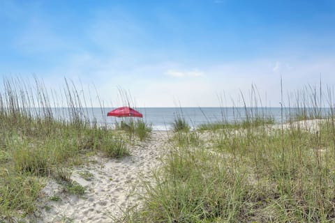 On the beach, sun loungers, beach towels