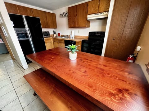 Unit 1 Kitchen and dining room. Dining table seats 6.