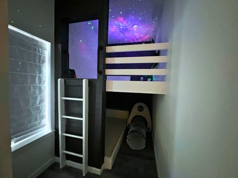 Kids will LOVE the outer space themed bunk rooms in each home with 4 twin beds, NASA tent, and TV