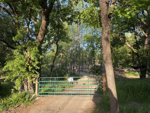 Green Gate leading to 10 peaceful acres at the Bonanza Barn Retreat!
