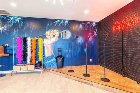 Karaoke stage and 2 microphones. Costume decorations provided too