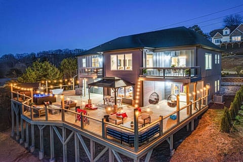 2k sq foot lit up deck w/ scenic mountain views and:
-8 person hot tub
-6 person barrel sauna
-2 person cold plunge
-gas grill
-dining for 10
-fireplace
-chaise lounge and seating
-cornhole, KanJam & more