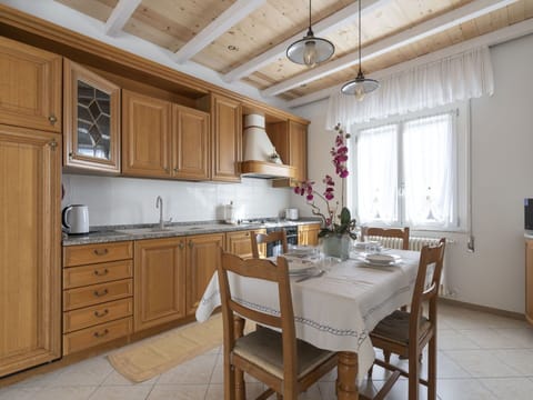 Furniture, Property, Cabinetry, Countertop, Wood, Table, Lighting, Chair, Interior Design, Kitchen