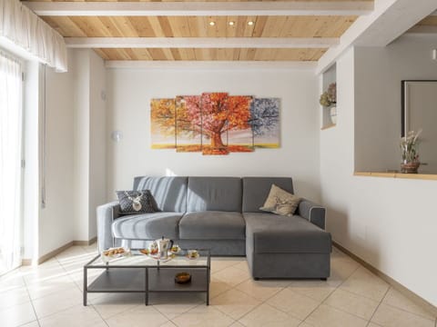 Furniture, Property, Couch, Picture Frame, Wood, Rectangle, Interior Design, Flooring, Floor