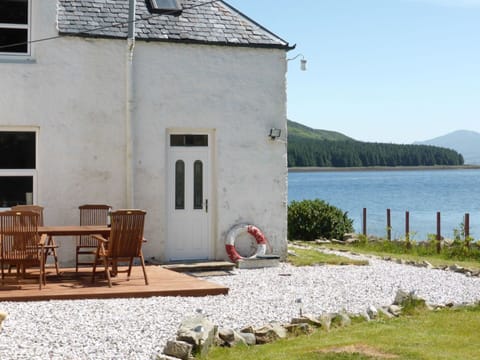 Water, Sky, Property, Building, Window, Chair, Plant, Wall, Cottage, House