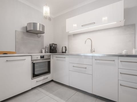 Countertop, Kitchen, Kitchen Appliance, Flooring, Cabinetry, Major Appliance, Interior Design, Floor, Home, Home Appliance