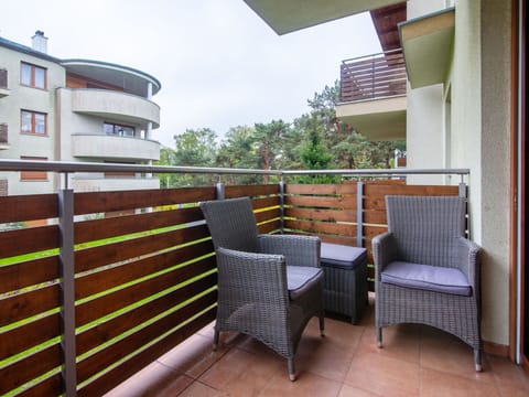 Furniture, Outdoor Furniture, Balcony, Apartment, Chair, Wood Stain, Hardwood, Shade, Houseplant, Porch