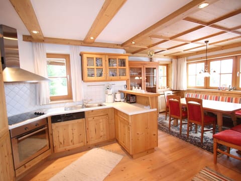 Furniture, Cabinetry, Property, Countertop, Window, Sink, Wood, Table, Interior Design, Lighting