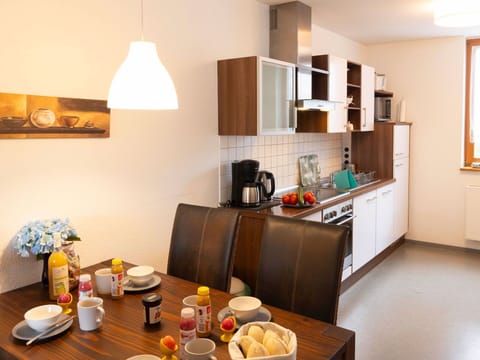 Furniture, Kitchen, Interior Design, Kitchen Appliance, Flooring, Countertop, Wood, Major Appliance, Room, Ceiling