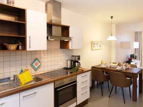 Kitchen, Countertop, Furniture, Kitchen Appliance, Interior Design, Major Appliance, Cabinetry, Flooring, Wood, Room