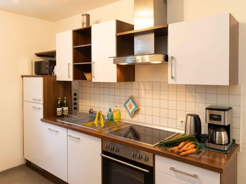 Kitchen Appliance, Kitchen, Countertop, Cabinetry, Major Appliance, Wood, Interior Design, Furniture, Flooring, Home Appliance