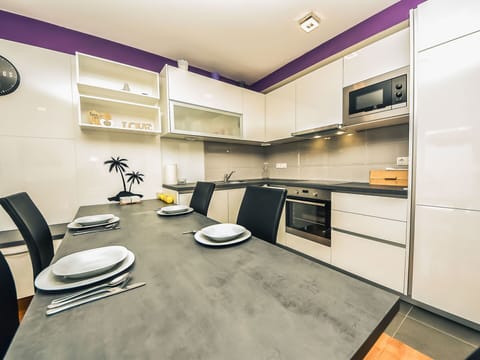 Cabinetry, Furniture, Property, Countertop, Table, Building, Kitchen, Chair, Lighting, Interior Design