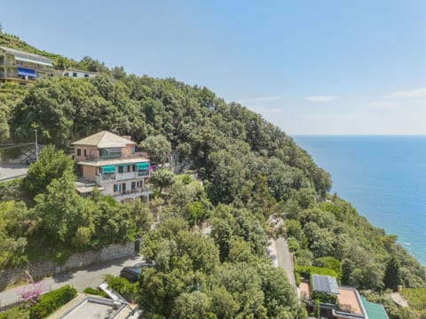 Sky, Plant, Property, Building, Tree, Cloud, Coastal And Oceanic Landforms, Urban Design, Condominium, Neighbourhood