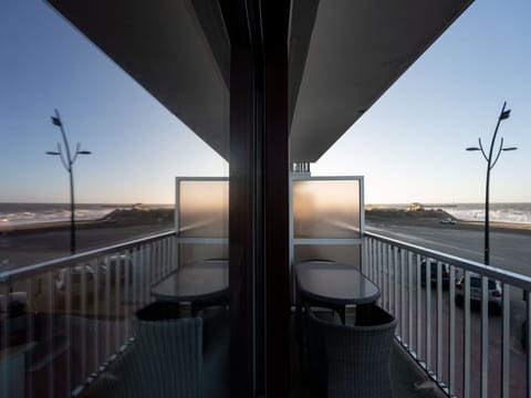 Sky, Water, Daytime, Building, Shade, Body Of Water, Chair, Architecture, Street Light, Sunlight