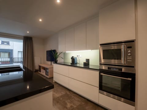 Furniture, Cabinetry, Countertop, Houseplant, Home Appliance, Wood, Plant, Kitchen, Kitchen Stove, Living Room