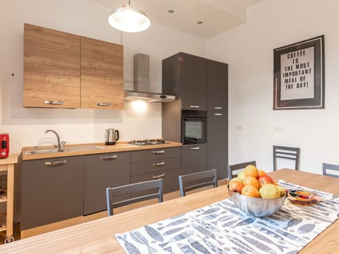 Countertop, Cabinetry, Sink, Property, Tap, Wood, Table, Kitchen, Interior Design, Plumbing Fixture