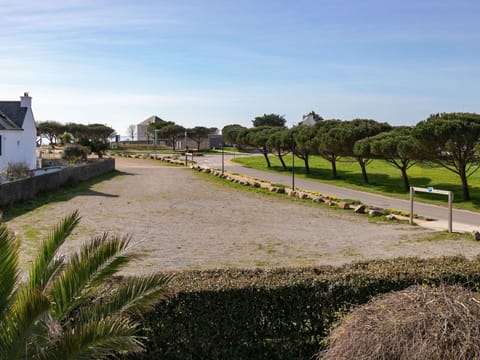 Sky, Plant, Cloud, Tree, Road Surface, Land Lot, Building, Asphalt, Landscape, Natural Landscape