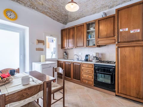 Cabinetry, Furniture, Countertop, Drawer, Wood, Lighting, Kitchen Stove, Kitchen, Interior Design, Home Appliance