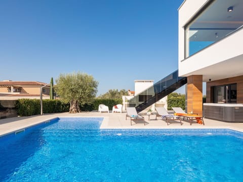 Water, Sky, Plant, Property, Swimming Pool, Shade, Leisure, Building, Composite Material, Real Estate