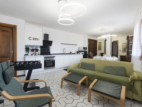 Furniture, Picture Frame, Property, Table, Couch, Building, Television, Wood, Living Room, Lighting