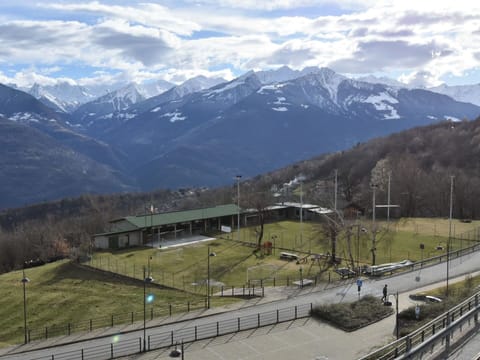 Plant, Sky, Building, Window, Tree, Urban Design, Body Of Water, Condominium, Arecales, Cloud