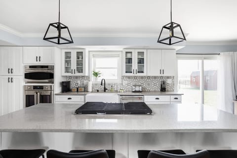 Executive style kitchen with high end appliances and all the needs for a home cooked meal.