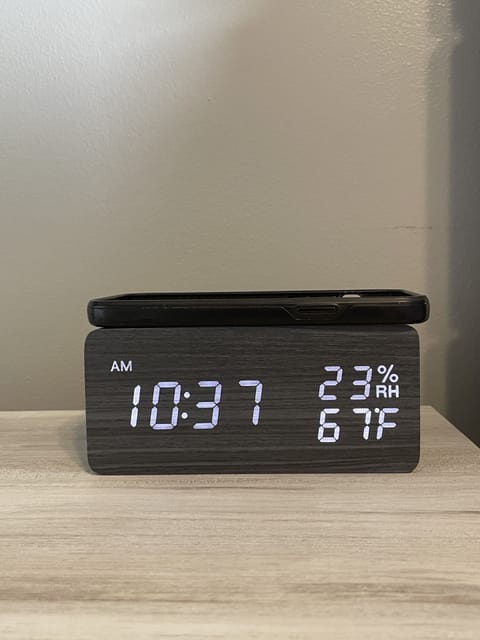 There are alarm clocks in all the bedrooms that are also wireless phone chargers too. No need to even get your charger out!
