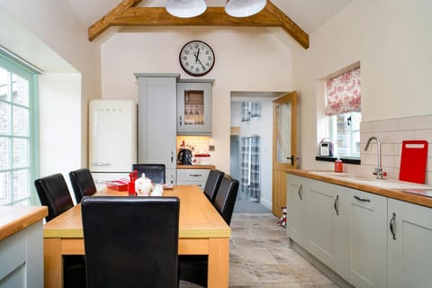 Kitchen and dining room with table and six chairs