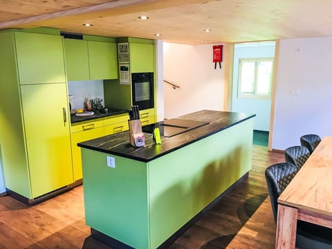 Flooring, Interior Design, Wood, Kitchen, Countertop, Floor, Furniture, Ceiling, Wood Flooring, Cabinetry