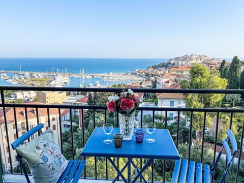 Sky, Table, Tableware, Property, Furniture, Building, Blue, Chair, Azure, Water