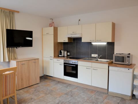 Cabinetry, Countertop, Kitchen Sink, Sink, Kitchen Stove, Kitchen, Tap, Home Appliance, Kitchen Appliance, Wood