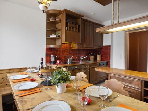 Furniture, Kitchen, Interior Design, Countertop, Cabinetry, Flooring, Wood, Ceiling, Light Fixture, Floor