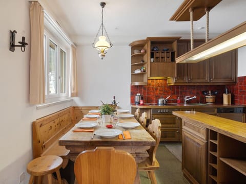 Furniture, Interior Design, Flooring, Kitchen, Wood, Ceiling, Countertop, Light Fixture, Cabinetry, Floor