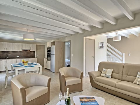 Furniture, Couch, Comfort, Table, Picture Frame, Lighting, Floor, Building, Flooring, Interior Design