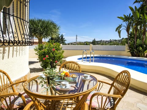 Sky, Water, Property, Furniture, Plant, Table, Azure, Chair, Building, Outdoor Furniture