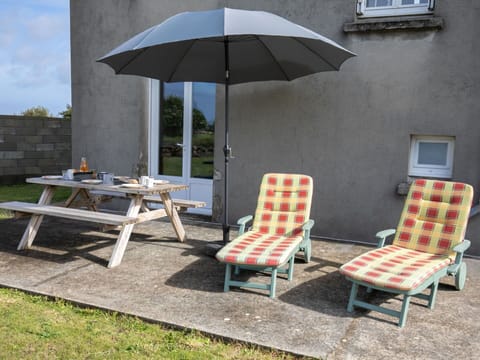 Furniture, Property, Umbrella, Plant, Table, Shade, Outdoor Furniture, Sky, Rectangle, Outdoor Table