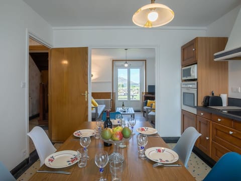 Table, Furniture, Property, Cabinetry, Chair, Tableware, Lighting, Interior Design, Wood, Dishware