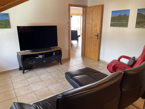 Furniture, Property, Television, Comfort, Wood, Interior Design, Living Room, Building, Floor, Flooring