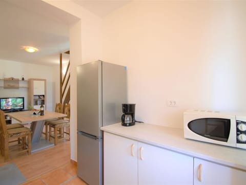 Cabinetry, Property, Furniture, Building, Home Appliance, Kitchen Appliance, Drawer, Table, Wood, Lighting