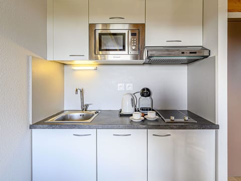 Sky, Property, Furniture, Table, Building, Water, Chair, Wood, Shade, Interior Design