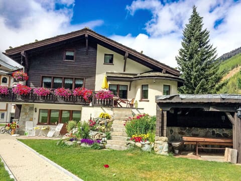 Cloud, Sky, Plant, Flower, Building, Property, Window, House, Flowerpot, Tree