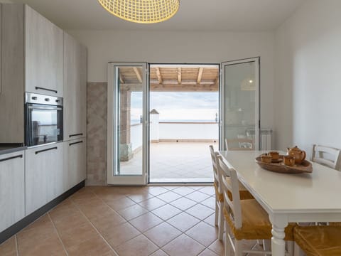 Property, Building, Wood, Interior Design, Countertop, Cabinetry, Floor, Kitchen, Kitchen Appliance, Door