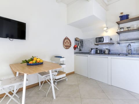 Furniture, Cabinetry, Table, Interior Design, Building, Home Appliance, Shelving, Wood, Floor, Flooring