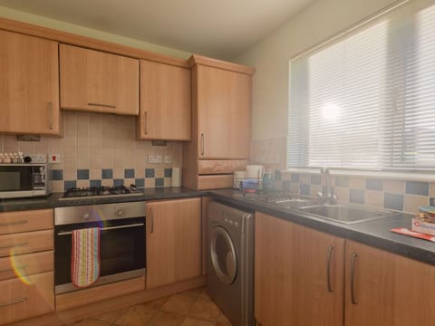 Cabinetry, Countertop, Window, Window Blind, Kitchen Stove, Kitchen Appliance, Wood, Kitchen, Home Appliance, Sink