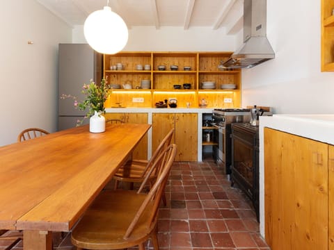 Cabinetry, Furniture, Countertop, Kitchen Sink, Table, Plant, Wood, Kitchen Appliance, Kitchen Stove, Kitchen