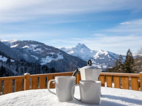 Cloud, Sky, Snow, Tableware, Mountain, Table, Freezing, Drinkware, Tree, Landscape