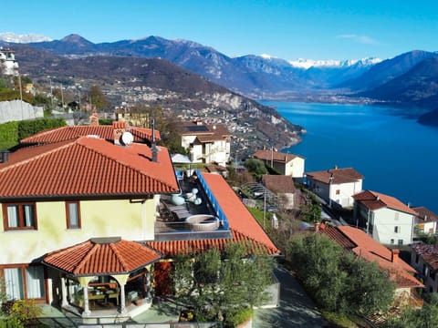 Sky, Water, Building, Mountain, Nature, Azure, Blue, Tree, Plant, House