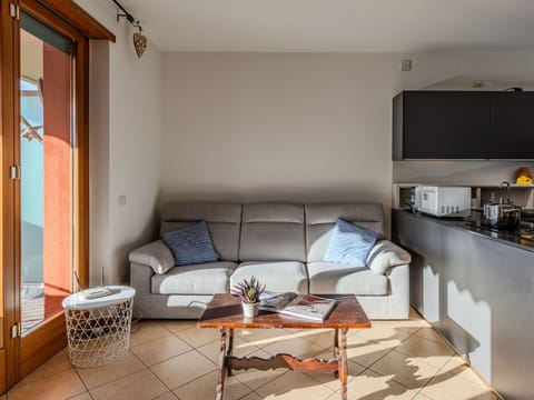 Couch, Furniture, Property, Table, Interior Design, Living Room, Wood, Floor, Shade, Flooring