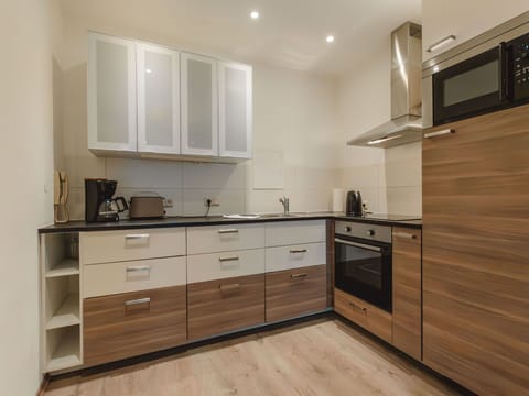 Cabinetry, Countertop, Furniture, Property, Drawer, Wood, Kitchen, Interior Design, Floor, Flooring