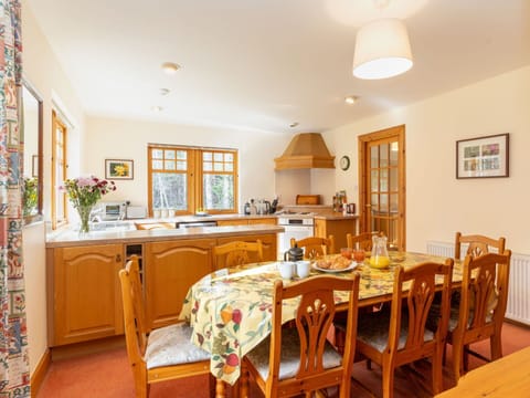 Furniture, Table, Cabinetry, Chair, Countertop, Wood, Orange, Interior Design, Kitchen, Window